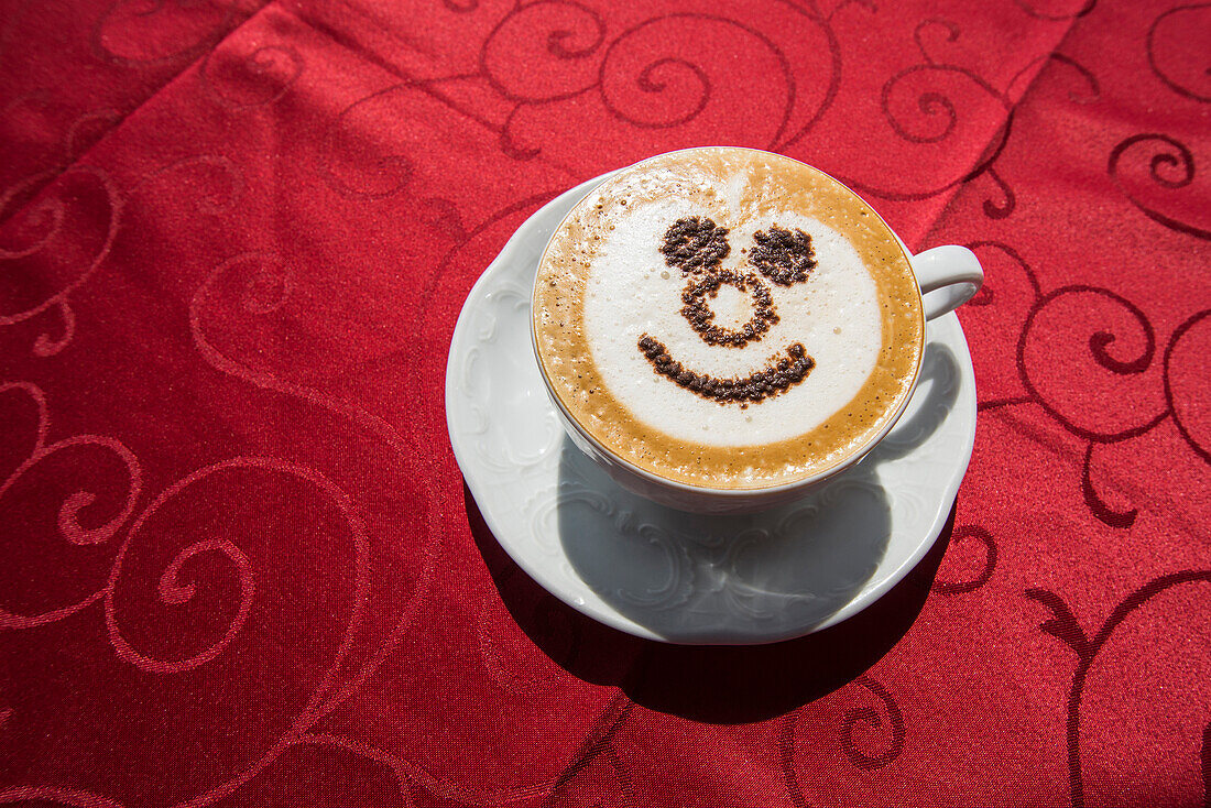 Cappuccino with smiley face, Tremezzo, Lake Como, Lago di Como, Province of Como, Lombardy, Italy