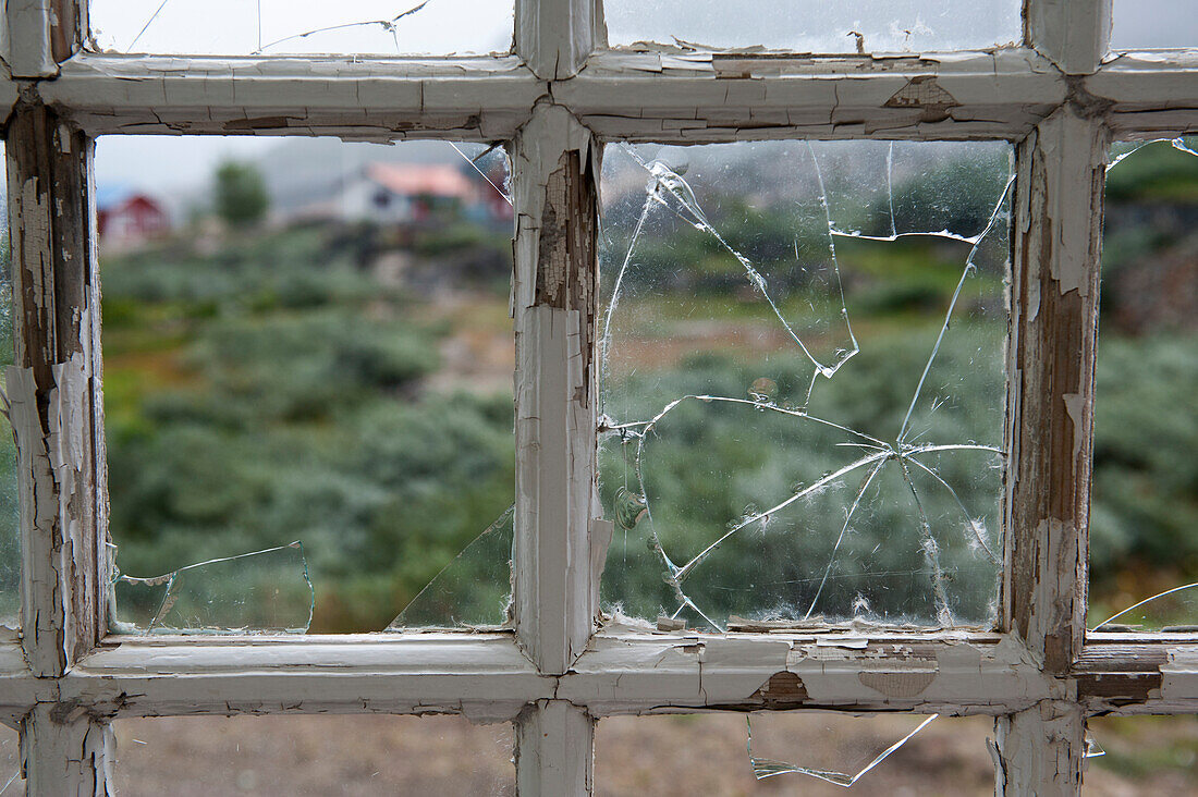 Broken window glass in a wooden house, Qaqortoq, Kujalleq, Greenland
