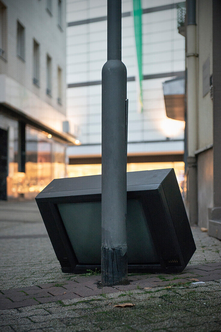 Disposed retro TV in the pedestrian area, Mainz, capital of Rhineland-Palatinate, Germany