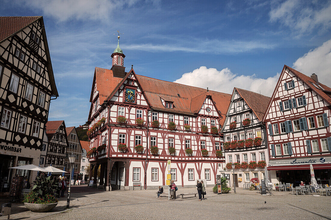 Half-timbered houses on the market square with city hall, Bad Urach, Swabian Alp, Baden-Wuerttemberg, Germany