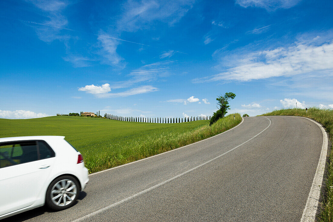 rental car and country residence and cypress trees, near San Quirico d`Orcia, Val d`Orcia, province of Siena, Tuscany, Italy, UNESCO World Heritage