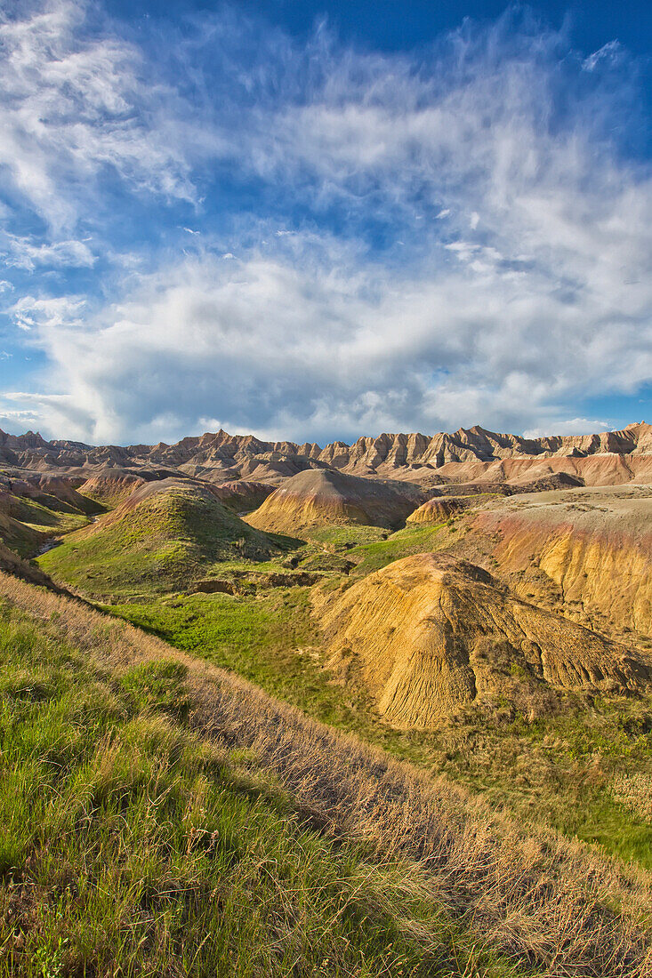 'Afternoon sunshine hits the yellow mounds region in badlands national park; south dakota united states of america'