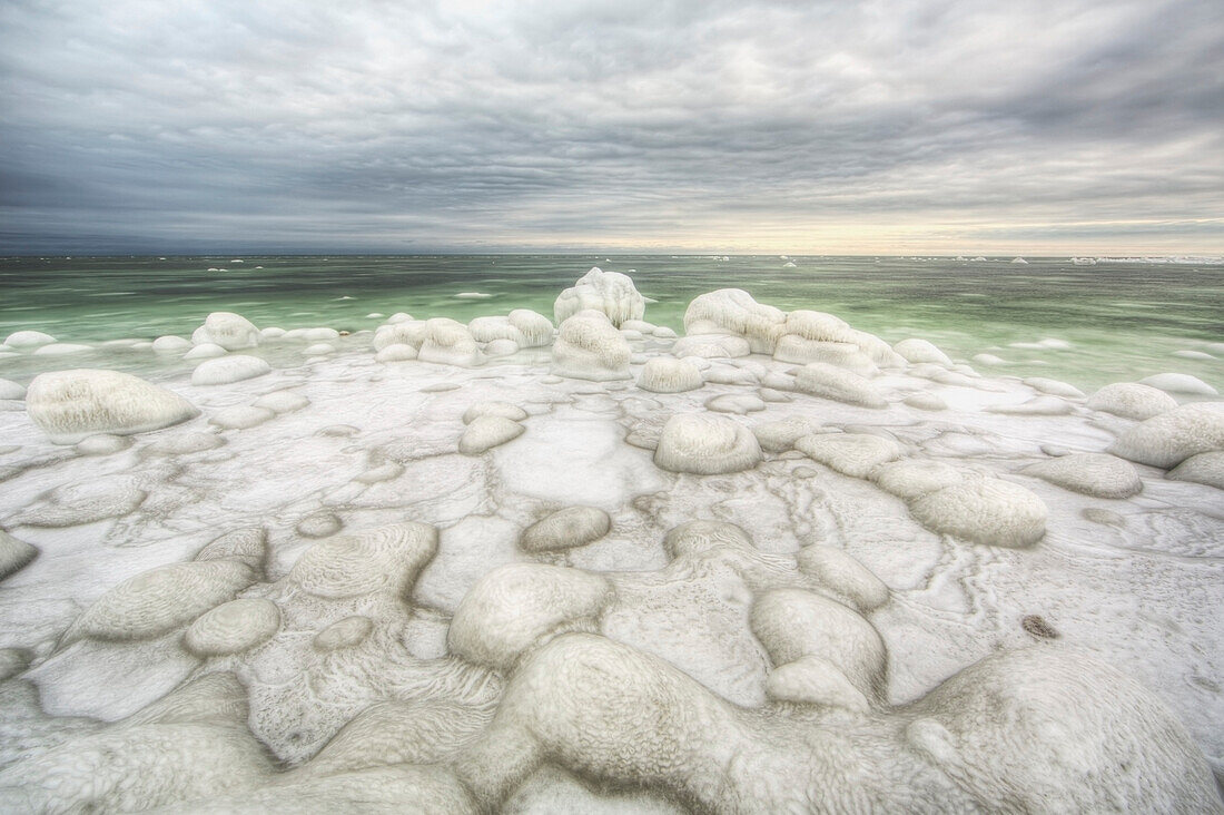 'The green ice filled water of hudson's bay;Manitoba canada'