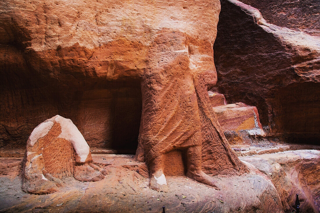 'Rock carved into the lower half of a human body;Petra jordan'