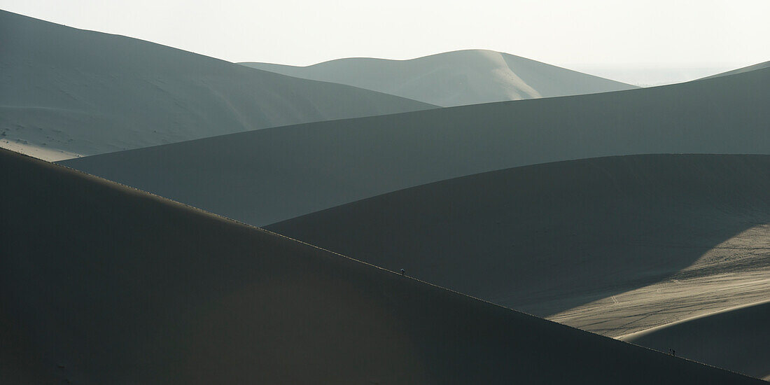 Desert landscape with slopes of sand