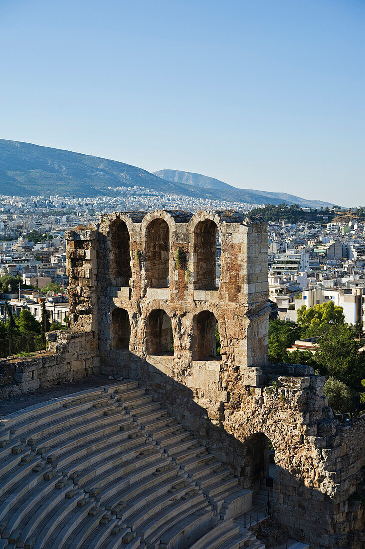 'Odeon of herodes atticus with view of athens;Athens greece'