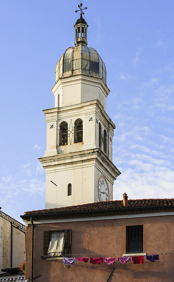 'Clock Tower On A Church And Laundry Hanging To Dry On A Clothesline Outside A House; Venice, Italy'