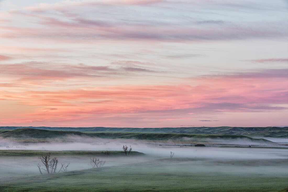 'Sunrise and fog in Grasslands National Park; Saskatchewan, Canada'