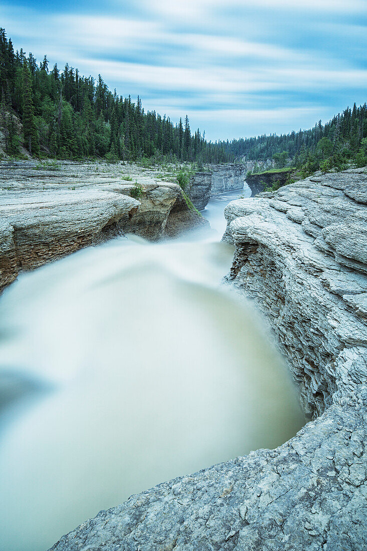'The Trout River flows over whittaker Falls on this one minute exposure; Northwest Territories, Canada'