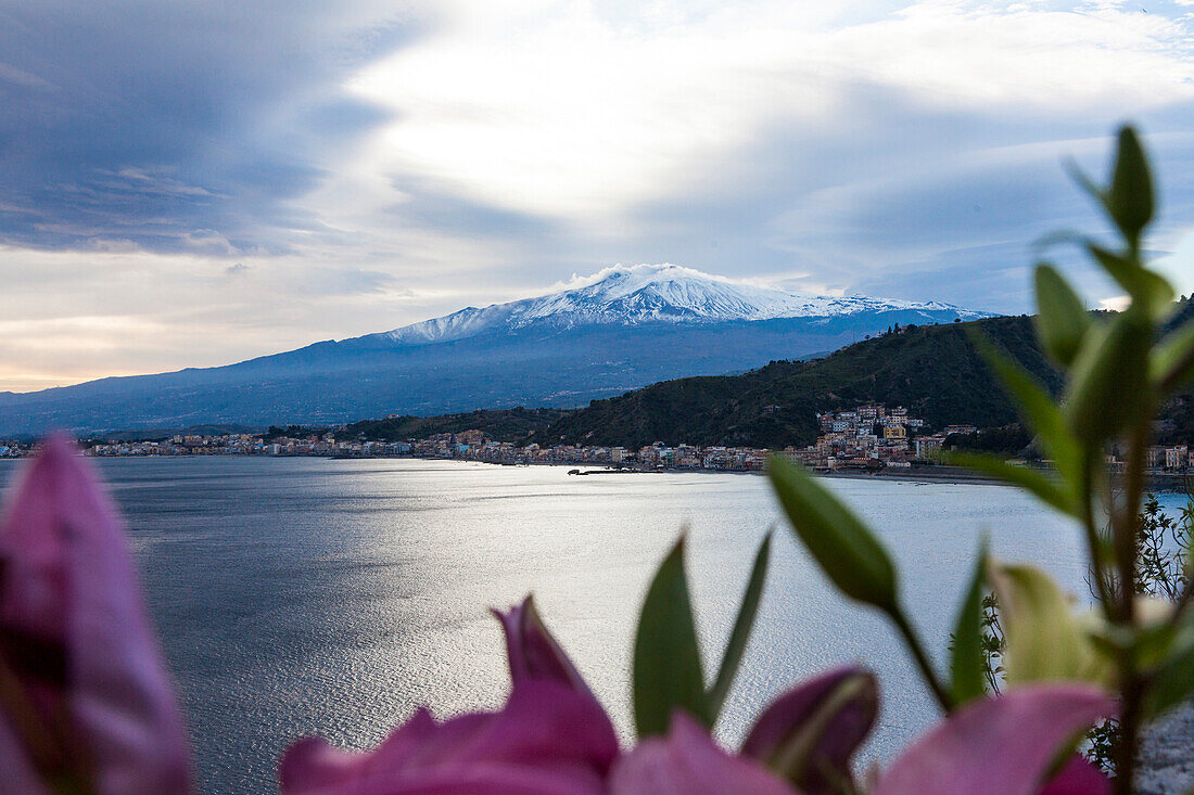 View along coast to Mount Etna, Taormina, Messina, Sicily, Italy