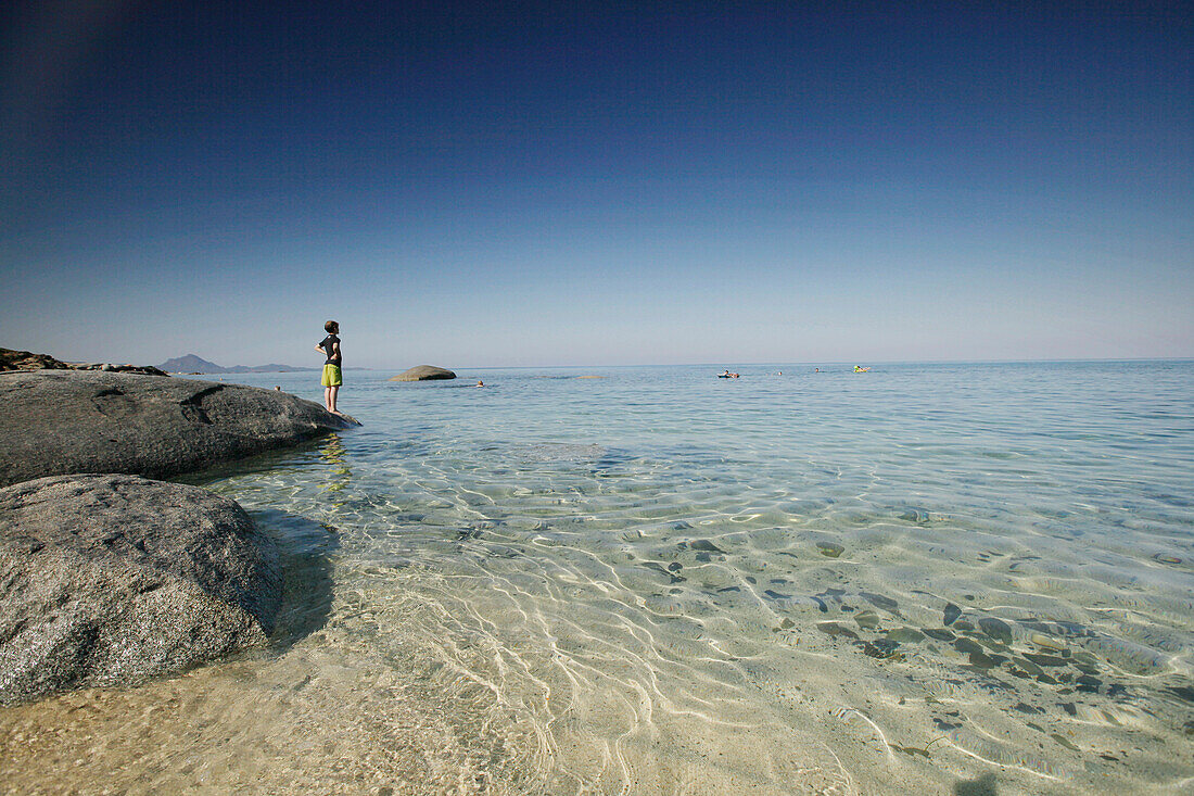 Boy at Sant Elmo beach, Costa Rei, Muravera, Sardinia, Italy