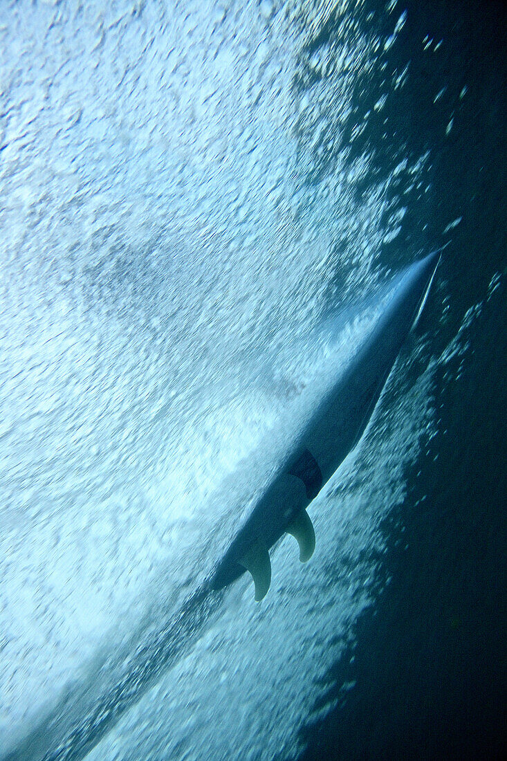 Surfboard in water, Praia, Santiago, Cape Verde