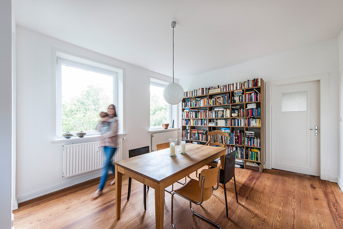 Mother and child in a dinning room, Hamburg, Germany