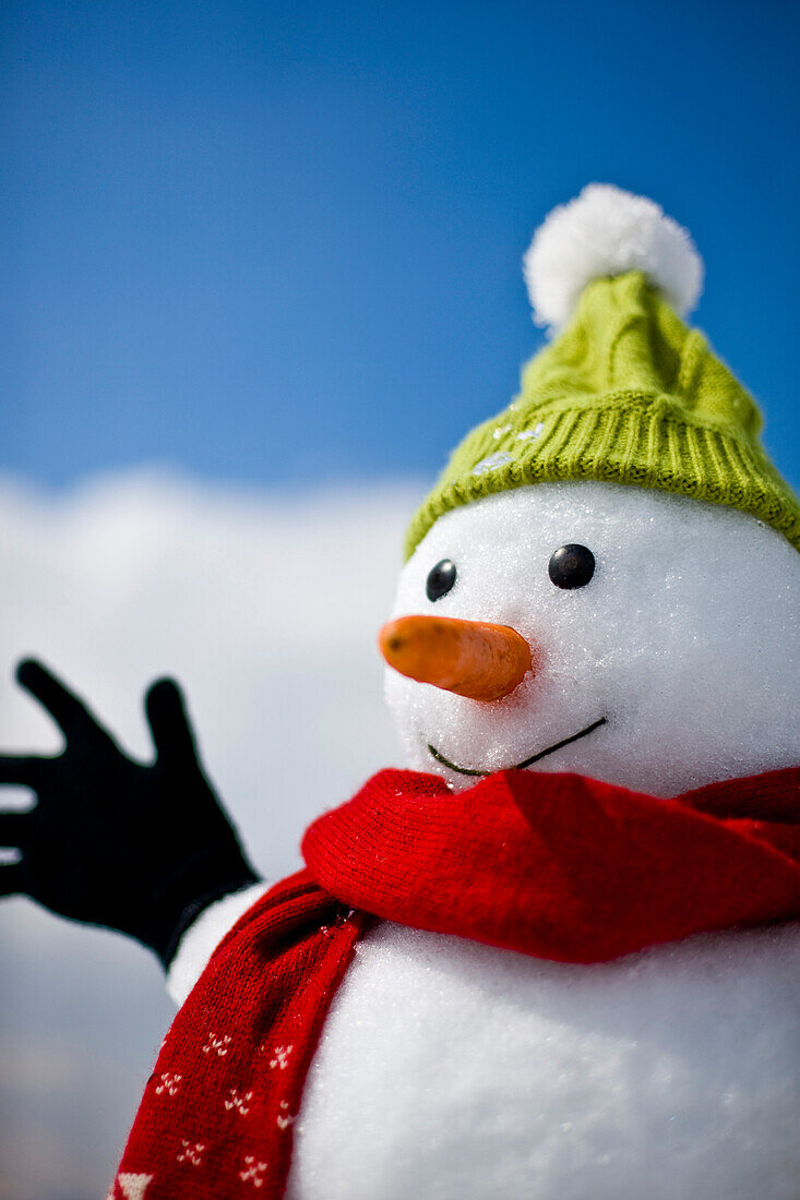 Snowman wearing cap and scarf, Kreischberg, Murau, Styria, Austria