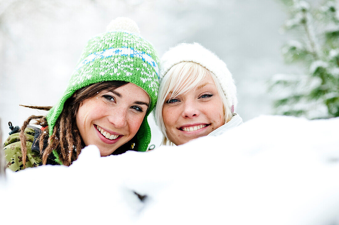 Two young women smiling at camera