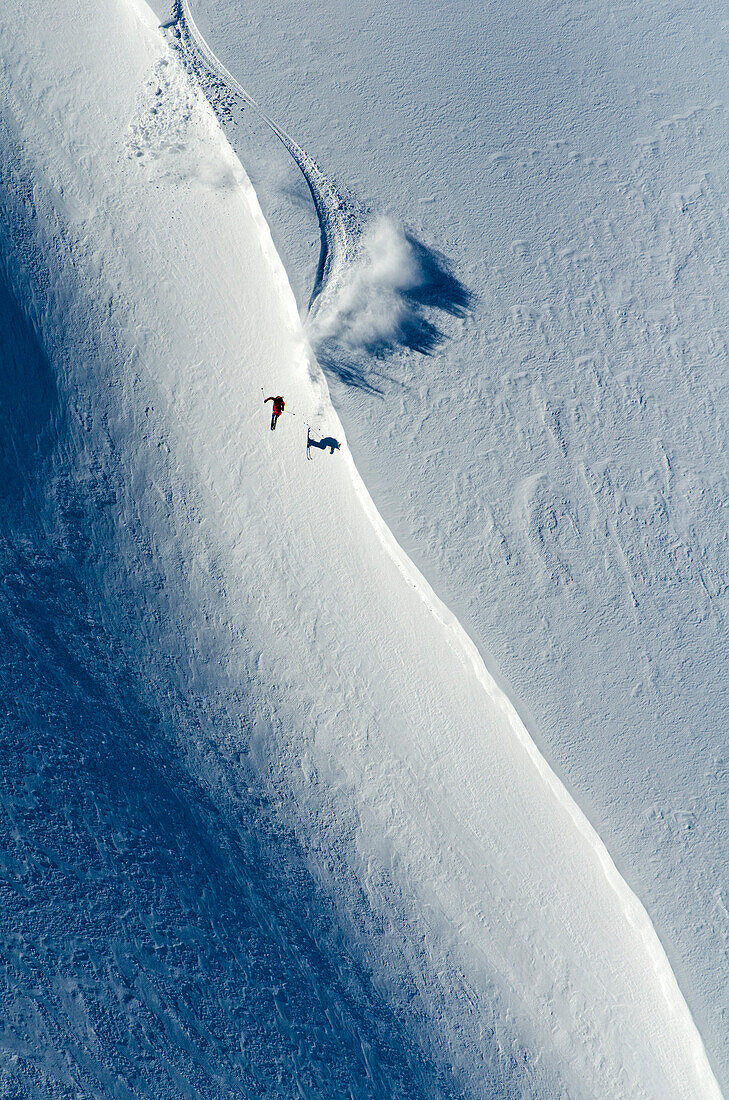 Freeskier jumping over cornice, Puma Lodge, Araucania Region, Chile