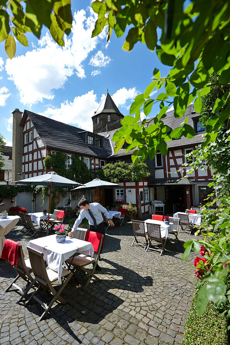Courtyard of a hotel restaurant, Braubach, Rhineland-Palatinate, Germany