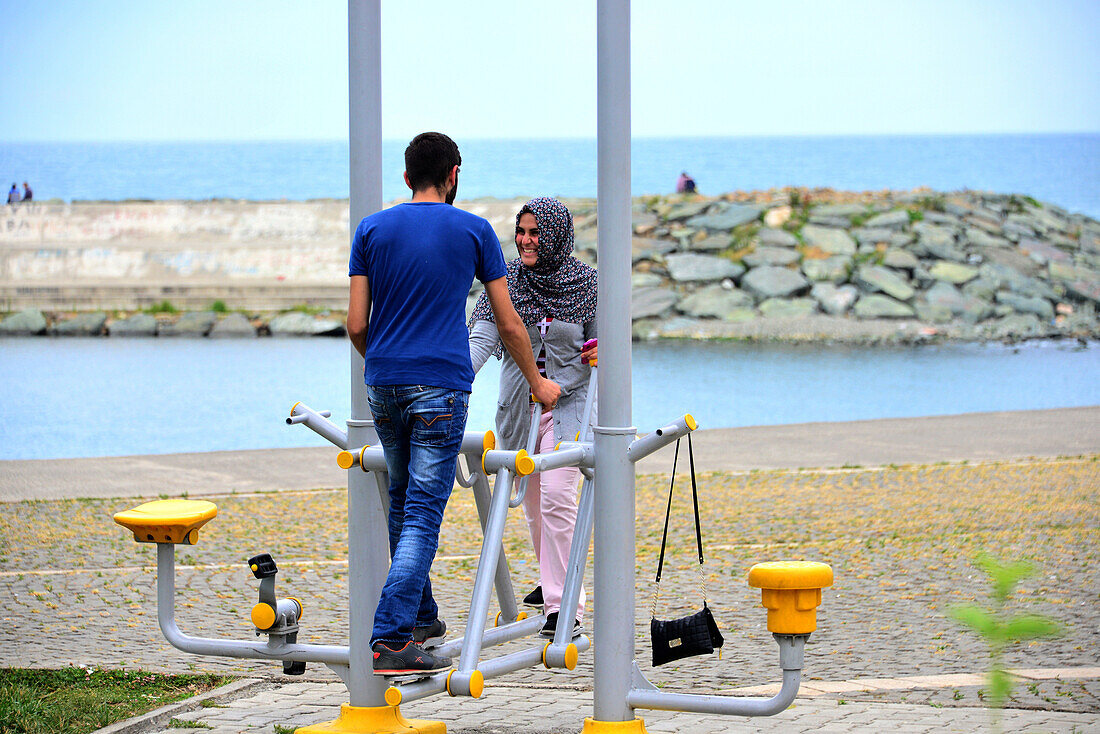 Couple at the waterfront in Trabzon, Black Sea, East Turkey, Turkey