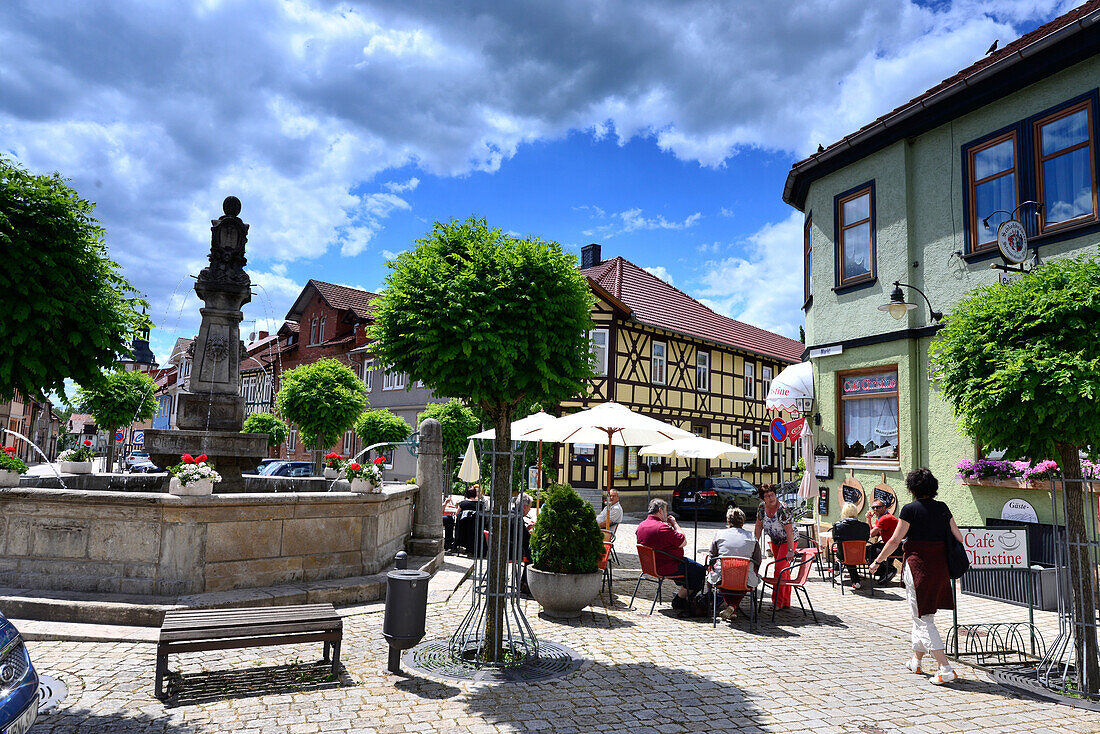 Cafe and fountain in Romhild, south of Thuringia, Germany