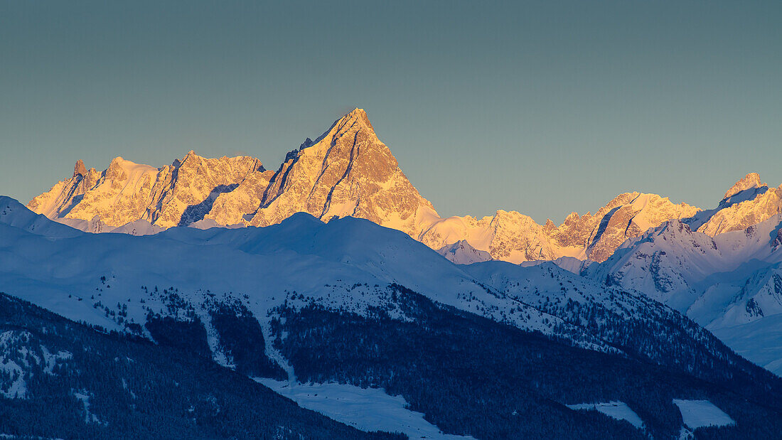 The Grandes Jorasses are in the light of a winter sunrise, Aosta Valley