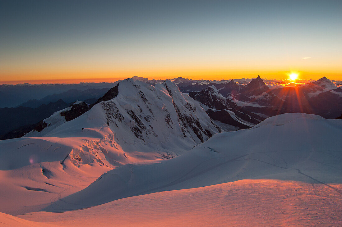 ''Sunset on the Lyskamm's north face; in the background, the Matterhorn, Aosta Valley''
