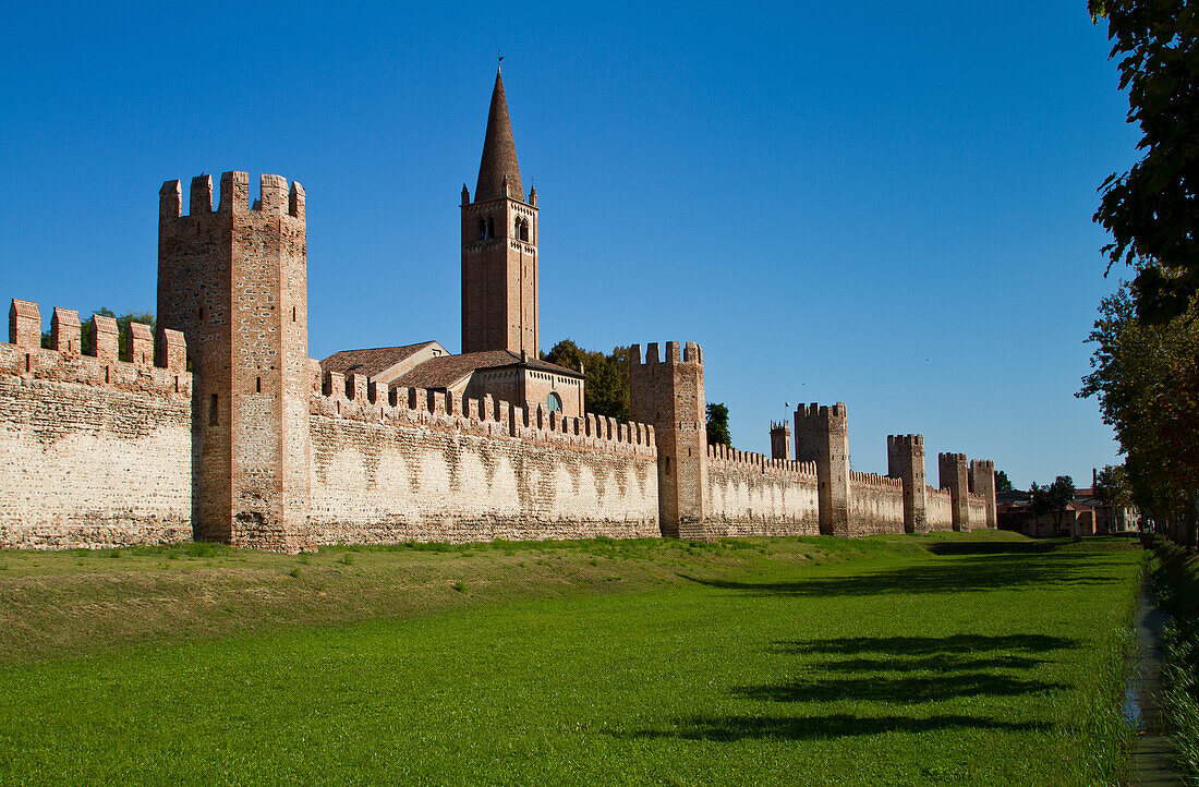 The walls of a medieval italian town, with towers and a steeple, Montagnana, Veneto