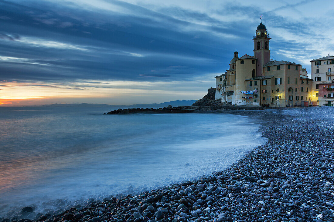 Sunset in Camogli town, in the cinque Terre site, Liguria, Italy .Panoramic from the beach with sea view .