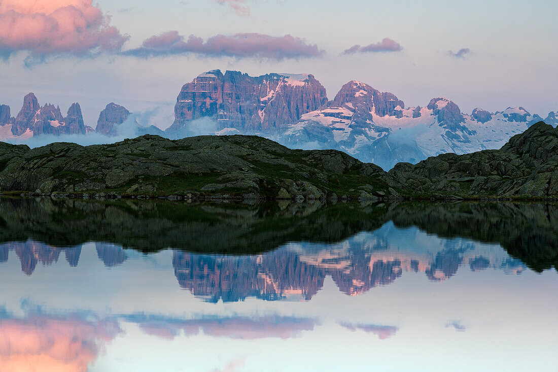 The Black lake near at Cornisello town with Brenta mountains  reflected in the water