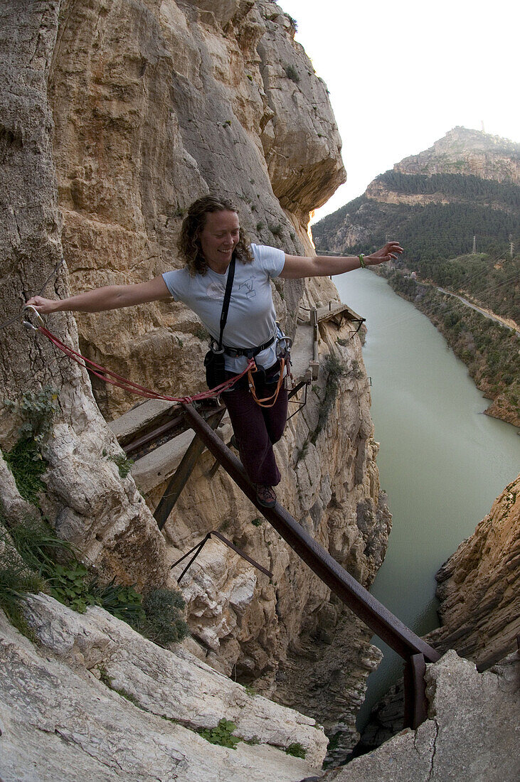 Senja Palonen on the Walkway, also known as the Camino del Rey the King's Path,. Built around 1905 to enable access and inspections to the workings in the Gorge and named after the visit of King Alfonso VIII in around 1921. El Chorro, Andalucia, Spain