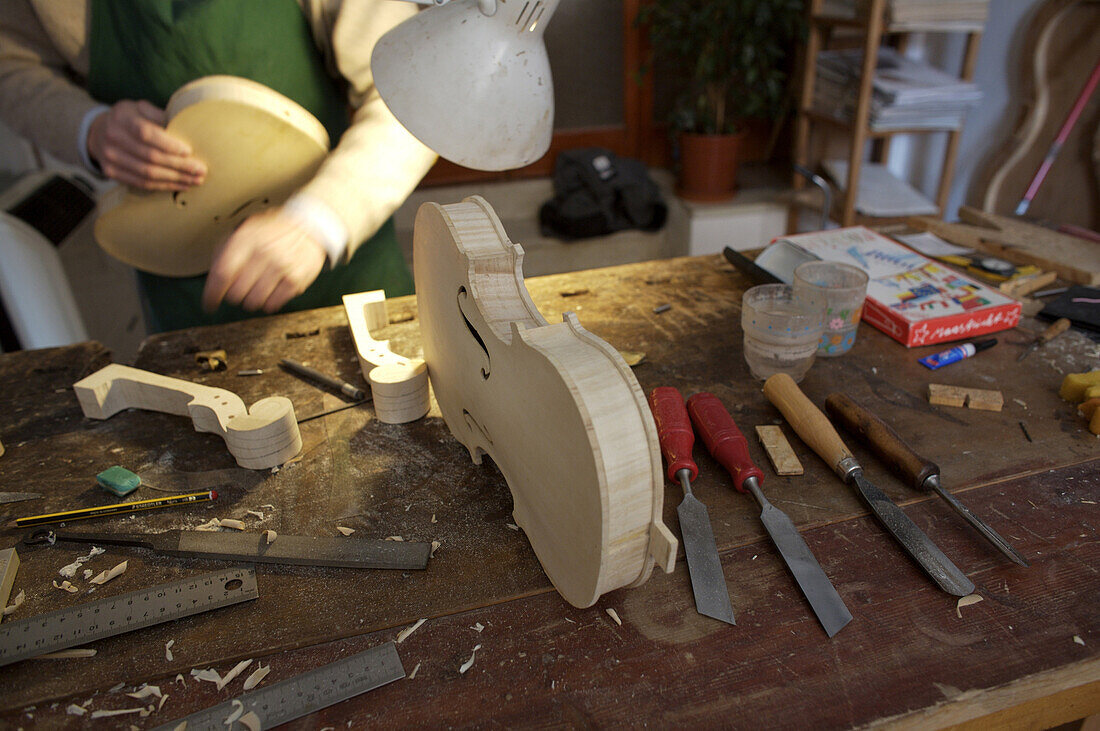 Sibylle Fehr-Borchardt not pictured, and Gaspar Borchardt create violins in their shop in the center of Cremona.