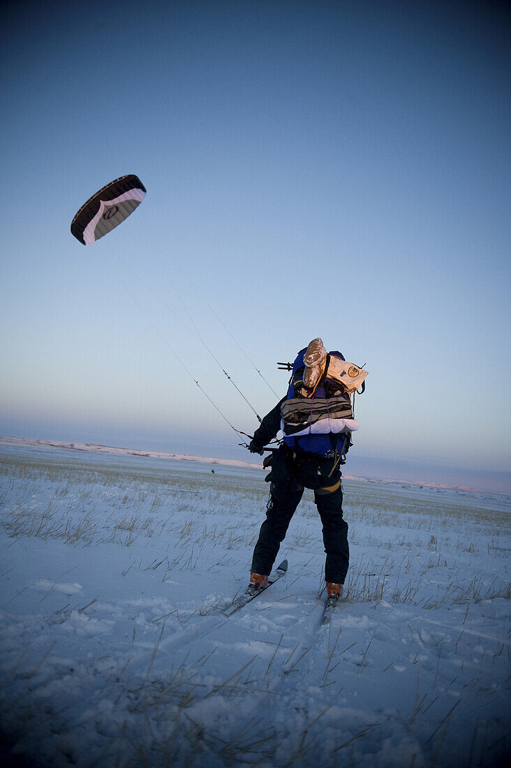 Jason Magness taking off with his snowkite.