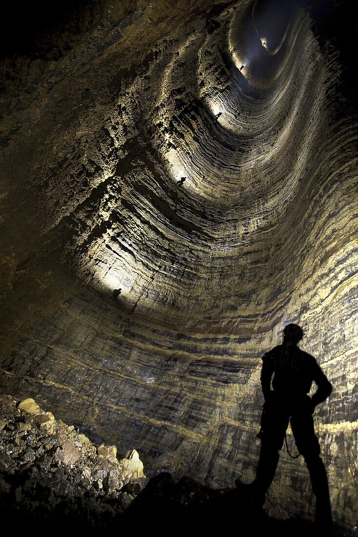 Looking up the largest underground shaft in the world. Miao Keng stands at 519m tall with more space high into the roof that has not yet been surveyed. Wulong, China.