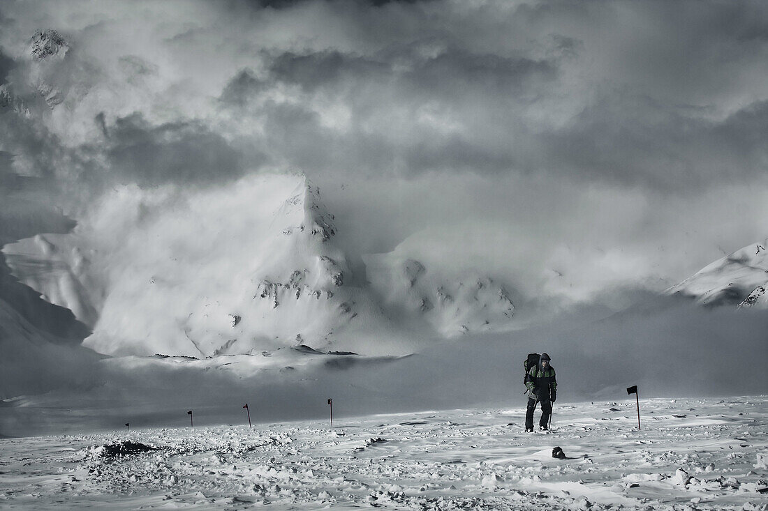 A man walking on Elbrus Mountain during Elbrus Race, the highest race in Europe.