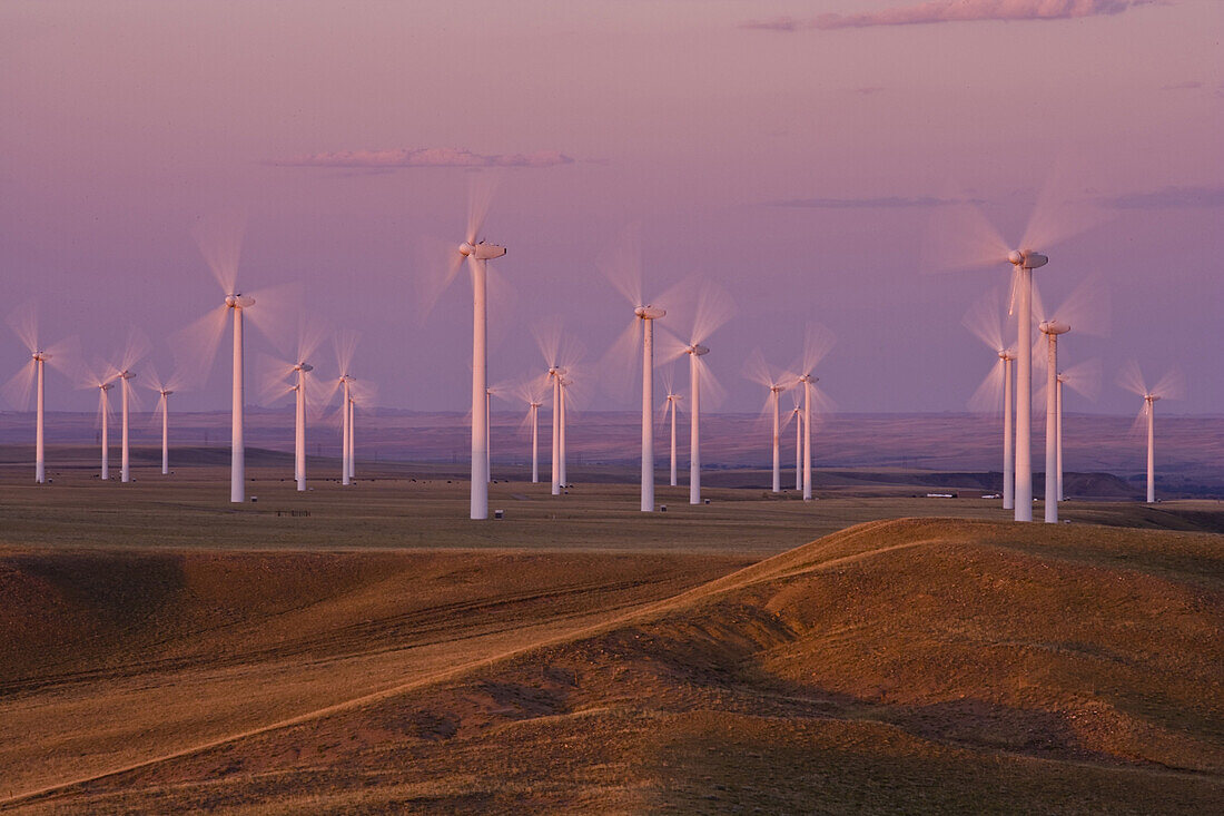 Wind turbines at sunset at a wind farm near Laramie Wyoming.