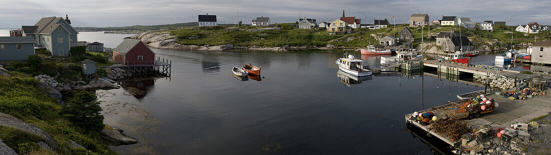 A panorama of Peggys Cove, a small pop 50, fishing village in Nova Scotia, Canada.