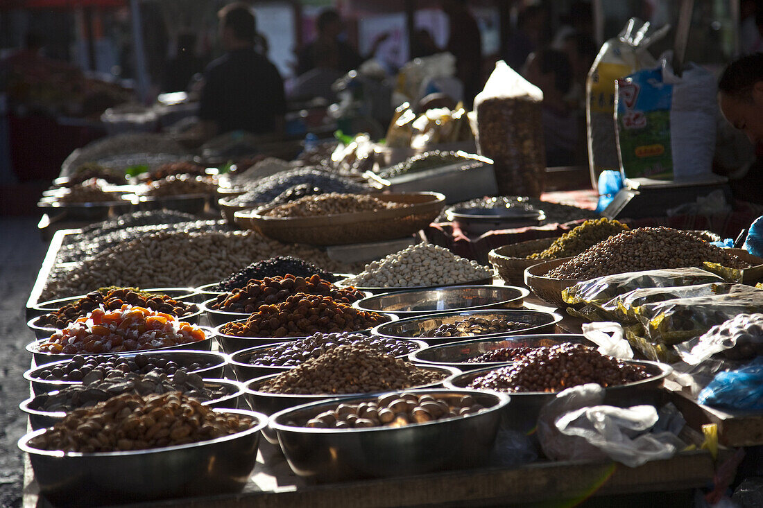 Dunhuang, Gansu Province, China - September 16, 2009: Dried fruit and nuts being sold at the market in Dunhuang.