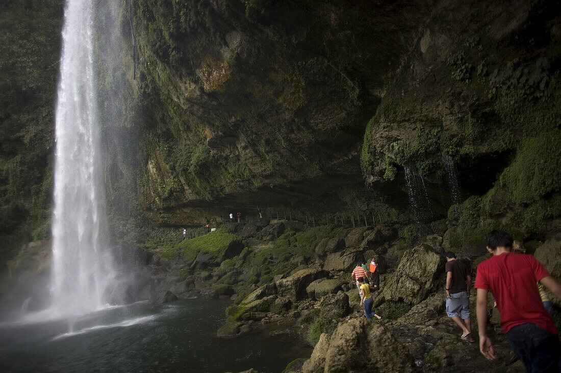 Tourists visit the Misol Ha waterfall in Salto de Agua, Chiapas, Mexico, February 20, 2010.