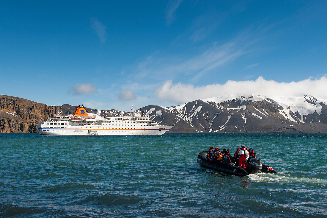 Zodiac raft excursion for passengers of expedition cruise ship MS Hanseatic (Hapag-Lloyd Cruises), Deception Island, South Shetland Islands, Antarctica