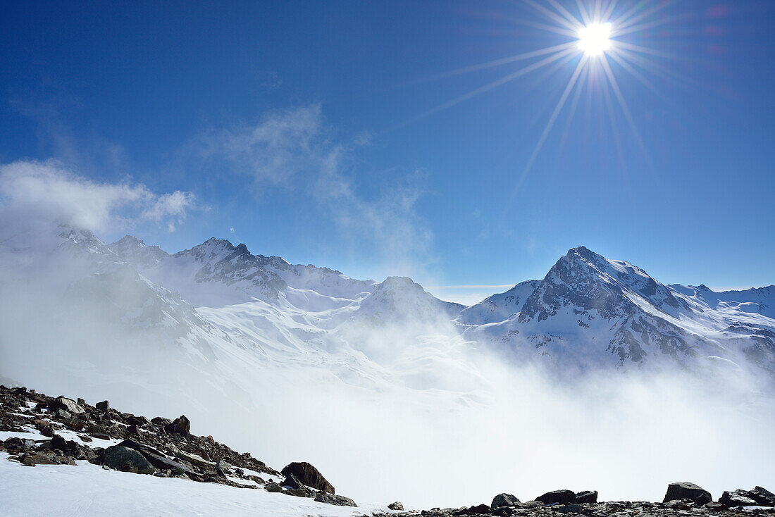 Mountain scenery in the fog, Piz Buin, Silvretta Range, Lower Engadin, Engadin, Canton of Graubuenden, Switzerland