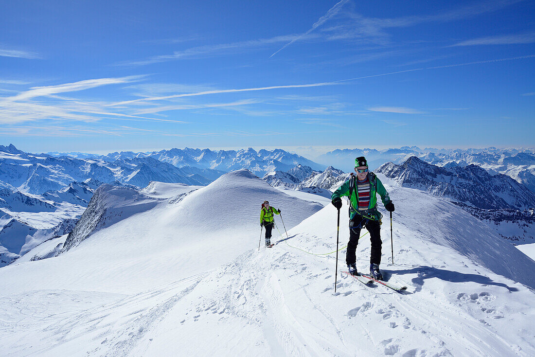 Two back-country skiers ascending to Grossvenediger, Venediger Group, Hohe Tauern National Park, Salzburg, Austria