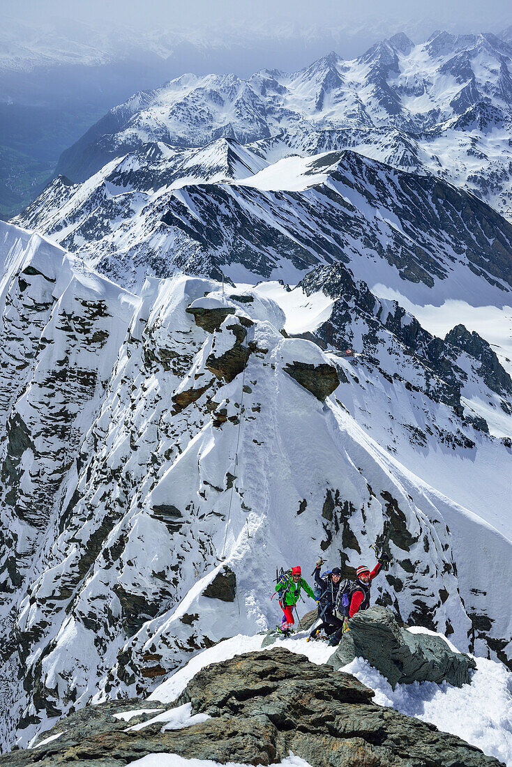 Three persons ascending to Grossglockner, Kleinglockner in background, Glockner Group, Hohe Tauern National Park, East Tyrol, Tyrol, Austria