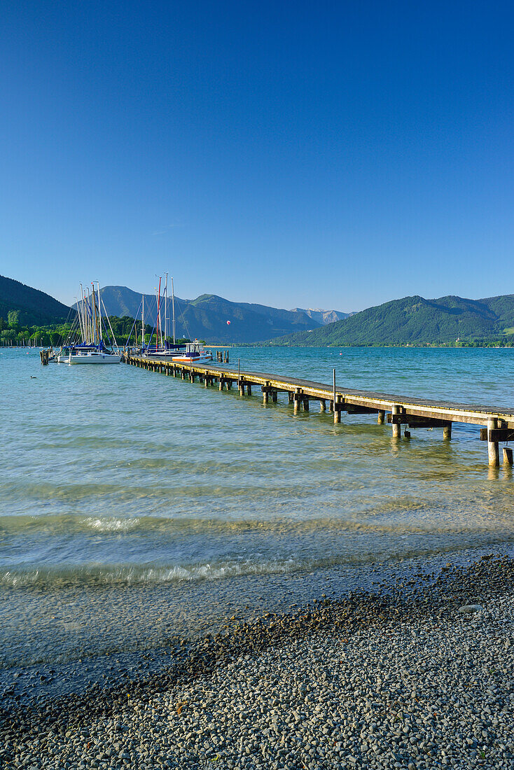 Jetty and sailing boats at lake Tegernsee, Bavarian Alps, Upper Bavaria, Bavaria, Germany