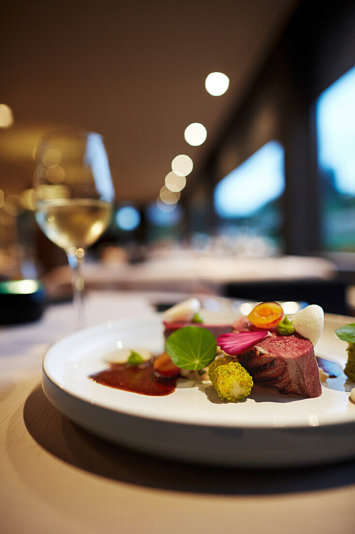 Venison on pearl barley, topinambur and sauce made of local beer, Le Cor de Chasse, food hotel by Michelin starred gourmet chef Mario Elias, manor house built in 1681 in Durbuy, Rue des Combattants 16, Wéris, Wallonia, Belgium