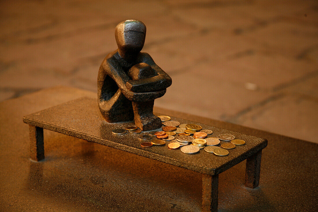 Sweden's smallest statue Iron Boy or Jaernpojke by artist Liss Eriksson in Gamla Stan old town, Stockholm, Sweden, Europe