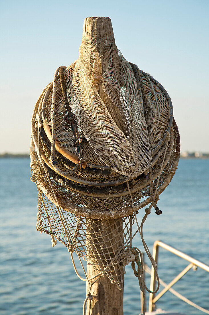 Fishing nets drying on a pillar, Burano, near Venice, Veneto, Italy, Europe
