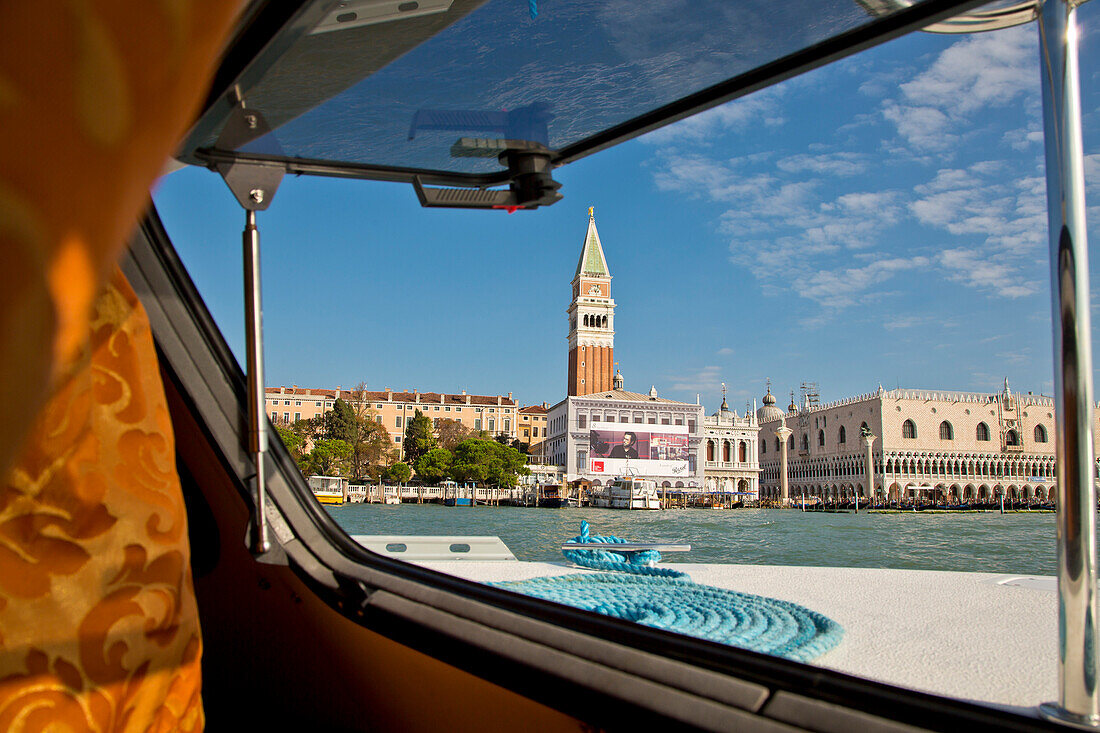 View through window of houseboat in Bacino San Marco with Campanile tower and Palazzo Ducale Doge's Palace, Venice, Veneto, Italy, Europe