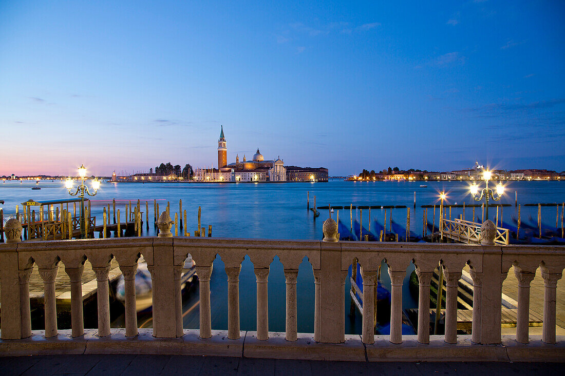 View from Riva delgi Schiavoni across the Bacino di San Marco to Isola di San Maggiore island with Chiesa di San Maggiore church at dawn, Venice, Veneto, Italy, Europe