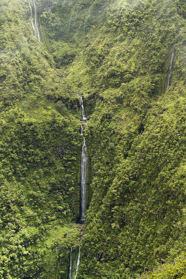MOLOKAI, HI - A view of the falls and mist on Waikolu stream part of the Kalaupapa National Historical Park on Molokai, Hawaii.  A out of the way destination for travelers, Molokai offers majestic natural scenes and solitude from the more traveled islands