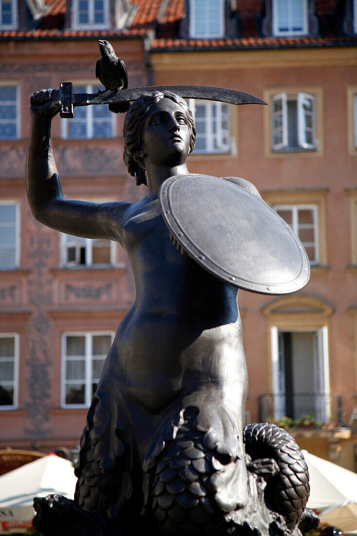 Statue of The Siren or mermaid Syrenka, graces the center of Warsaw's Old Town Square. The much loved Syrenka is connected to the city's mythological past and has featured in Warsaw's official Coat of Arms since 1938, as well as numerous other symbols and