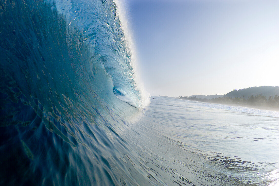 water view of tubing wave at Backdoor Pipeline on the north shore of Oahu, Hawaii